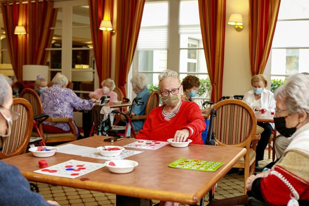 residents playing and wearing masks 2020